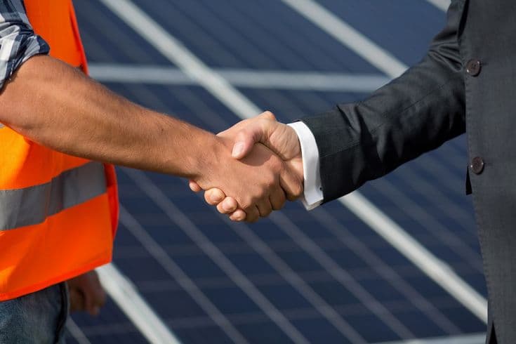 Happy solar customer partnership
